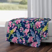 Parrots and magnolia flowers on navy blue