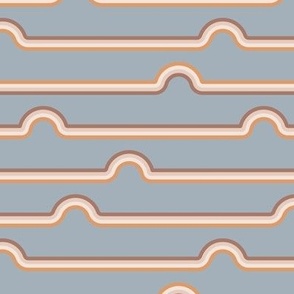 Neutral colored stripes with rainbows on light blue