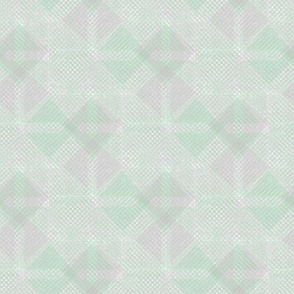 Pale textured geometric pattern, light gray and green background.