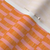 Minimalist geometric textured check in orange and salmon