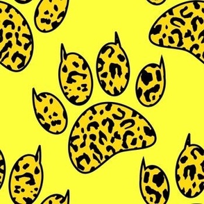 leopard paw print pattern with yellow background