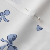 medium scale tossed handddrawn preppy bows in bluebell and navy blue