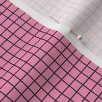 Black grid over light pink