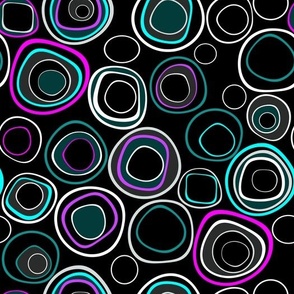 Multicolored rings on a black background retro sixties