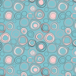 Multicolored rings on gray blue background in retro sixties style 