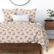Large - A checkerboard design created from block printed triangular elements on a flax coloured textured linen. Peach fuzz, rust, terracotta and orange. 