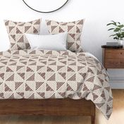 Large - A checkerboard design created from block printed triangular elements on a flax coloured textured linen. Mocha, burgundy, brown and rosewood.