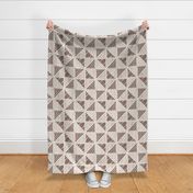 Large - A checkerboard design created from block printed triangular elements on a flax coloured textured linen. Mocha, burgundy, brown and rosewood.