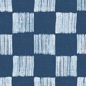 Medium - Hand drawn 2 inch squares, watercolor checkerboard pattern – painted geometric brush strokes bleaching out the denim texture giving a grungy, faded effect to the dark indigo blue.