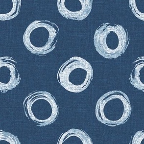 Medium - Hand drawn watercolor circles and rings – painted geometric brush strokes bleaching out the denim texture giving a grungy, faded effect to the dark indigo blue.