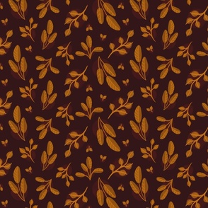 Gold leaves on a brown background