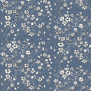 Scattered flowers on blue
