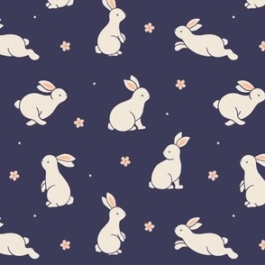 Small scale / Bunnies and blooms beige on deep navy blue / Cute spring bunny rabbits peach pink daisy flowers in light cream ivory on cool dark neutral background / Playful woodland forest baby animals