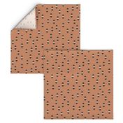 Aztec details - minimalist geometric triangles and squares on terracotta