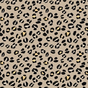 Leopard print in neutral color with pop of yellow
