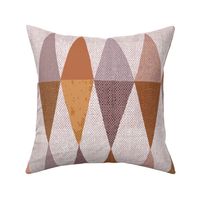 Harlequin textured wonky triangles in warm earthy tones