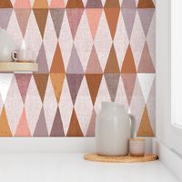 Harlequin textured wonky triangles in warm earthy tones