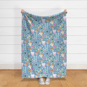 Large Scale Tossed Happy Sea Creatures on Blue Polka Dot Ground