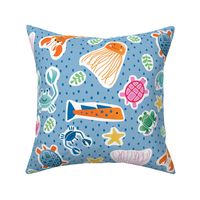 Large Scale Tossed Happy Sea Creatures on Blue Polka Dot Ground