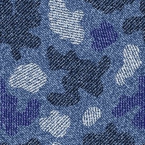 Blue spotted camouflage denim texture
