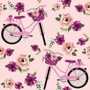 Bicycles with baskets of pink flowers  pink floral summer spring flowers