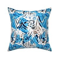 Blue tropical leaves on a white background with blue and brown leopard spots.