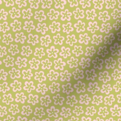 Small groovy floral shapes outlined in light green 