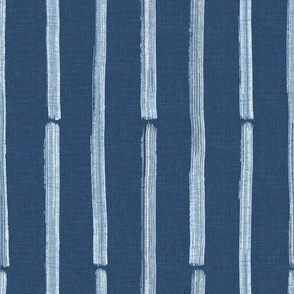 Medium - Hand drawn half inch watercolor paint striped pattern – painted geometric brush strokes bleaching out the denim texture giving a grungy, faded effect to the dark indigo blue.