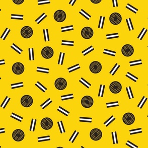 For the love of cookies! Chocolate sandwich cookies on yellow background.