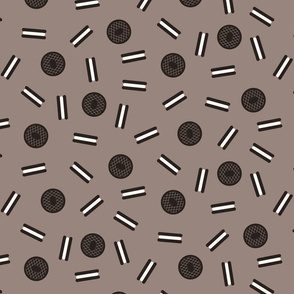 For the love of cookies! Chocolate sandwich cookies on warm gray background.
