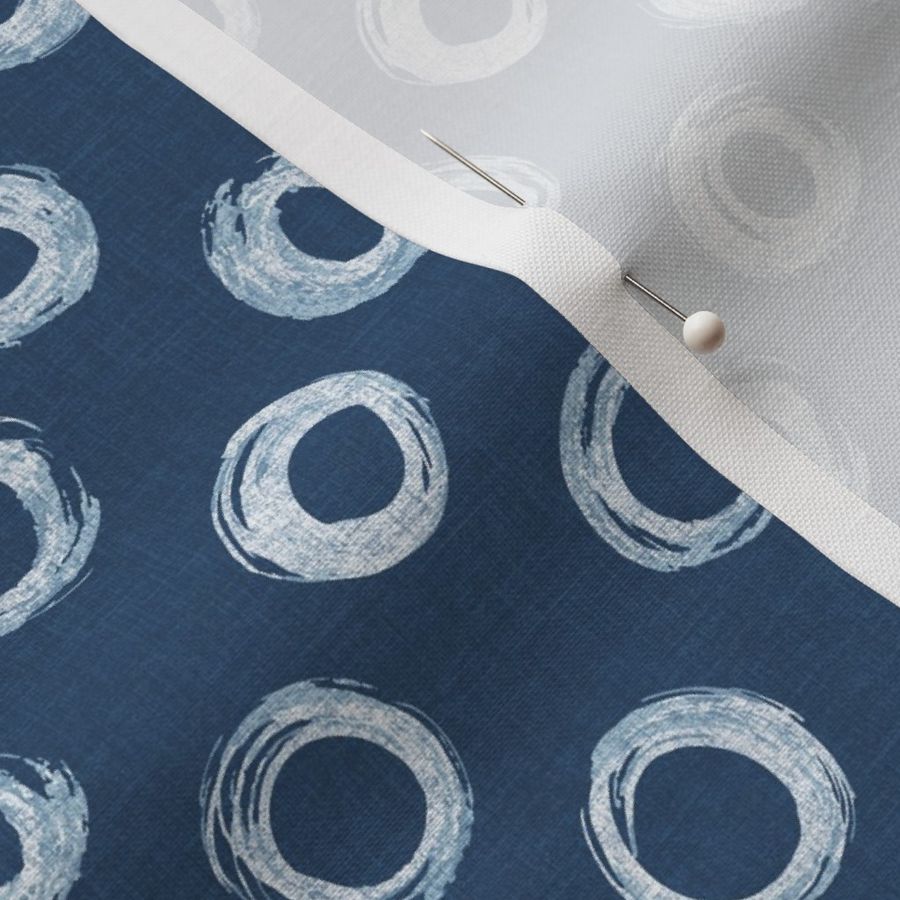 Small - Hand drawn watercolor circles and rings – painted geometric brush strokes bleaching out the denim texture giving a grungy, faded effect to the dark indigo blue.