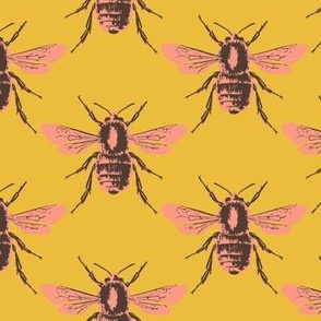 Medium scale bee geometric block print diamond pattern in a pretty peach pink, dark brown and vibrant saffron yellow.