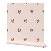 Hand drawn bows in brown color on cream background