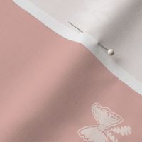 Hand drawn bows in baby pink background