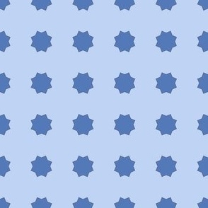 Spanish Tile- Geometric Flowers-Blues on Light Blue Background.