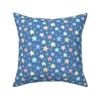 simple pastel stars and small sunbursts on a blue background