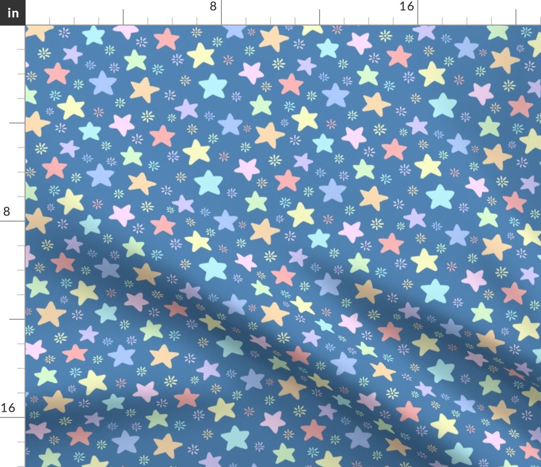 simple pastel stars and small sunbursts on a blue background