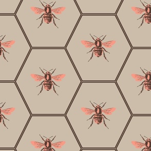 Large scale block print hexagon honeycomb bees in vibrant peach pink on brown and tan.