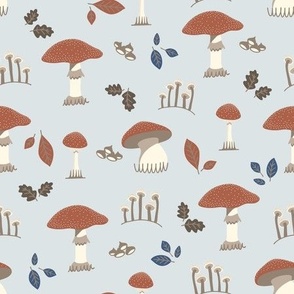 Mushrooms in the woodland undergrowth - sky blue
