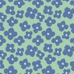 Abstract flowers in blue on green small