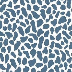 Medium scale wild animal print, two color, deep sea blue on a white ground.