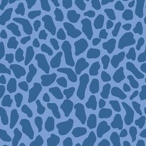 Medium scale wild animal print, two color, in cerulean blue on a periwinkle ground.