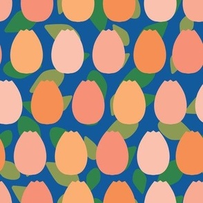 blue background with peach coloured tulips and green leaves pattern