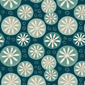 geometric sand dollars in white and teal green