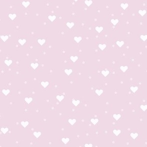 (S) White hearts and dots over soft pink background