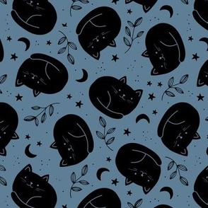 Cute halloween black cats boho style moon stars and leaves on moody blue night