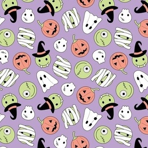 Halloween cutesy monsters - zombie pumpkins ghosts and witches on lilac