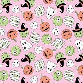 Halloween cutesy monsters - zombie pumpkins ghosts and witches on pink