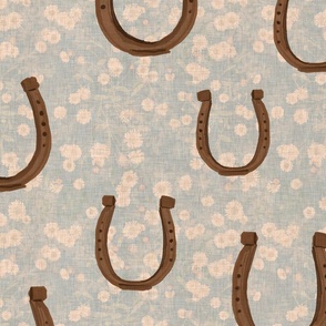 Lucky horse shoe pattern on blue with daisy flowers