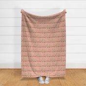 Rows of blooming saguaro cacti on soft pink linen texture | small